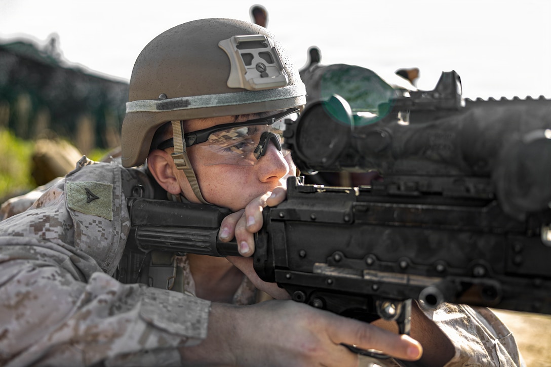 U.S. Marine Corps Lance Cpl. Darrian J. Doyle, combat engineer, Marine Wing Support Squadron 273, Marine Air Control Group 28, 2nd Marine Aircraft Wing, fires an M240B machine gun while conducting a field exercise at Townsend Bombing Range, Georgia, May 6, 2026. This FEX was conducted to sustain MWSS-273’s proficiency in mission-essential tasks and increase readiness for the upcoming Weapons and Tactics Instructor course 1-27. (U.S. Marine Corps photo by Cpl. Isabella L. Renaud)