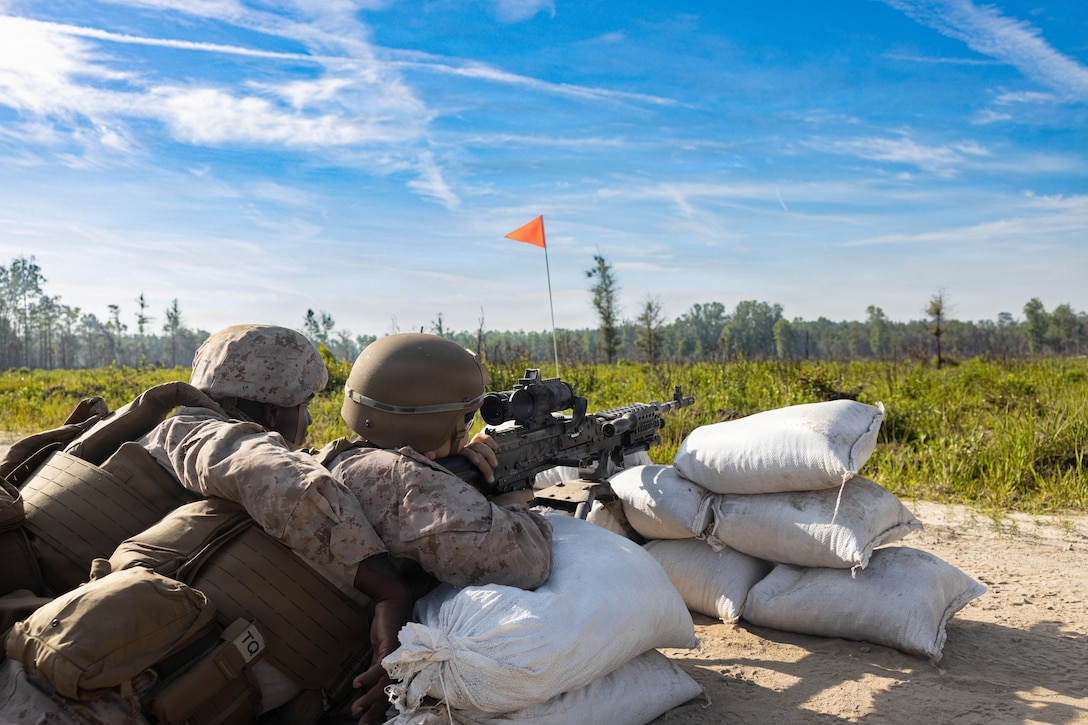 U.S. Marines with Marine Wing Support Squadron 273, Marine Air Control Group 28, 2nd Marine Aircraft Wing, fire M240B machine guns while conducting a field exercise at Townsend Bombing Range, Georgia, May 6, 2026. This FEX was conducted to sustain MWSS-273’s proficiency in mission-essential tasks and increase readiness for the upcoming Weapons and Tactics Instructor course 1-27. (U.S. Marine Corps photo by Cpl. Isabella L. Renaud)