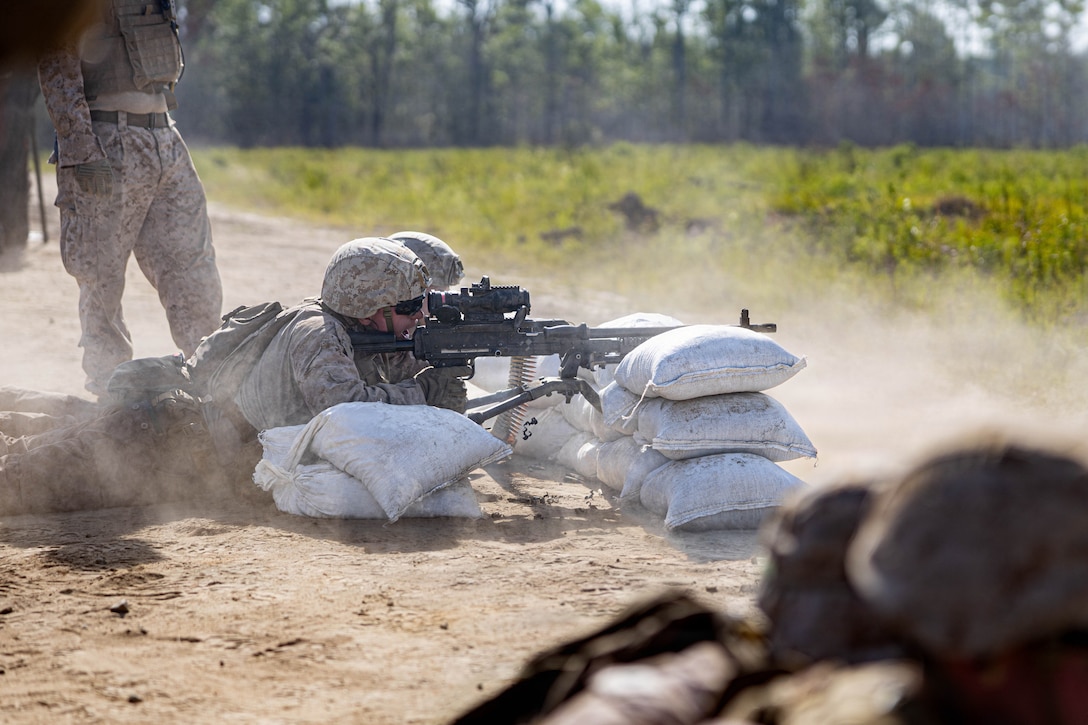 U.S. Marine Corps Lance Cpl. Jude E. Griffith, combat engineer, Marine Wing Support Squadron 273, Marine Air Control Group 28, 2nd Marine Aircraft Wing, fires an M240B machine gun while conducting a field exercise at Townsend Bombing Range, Georgia, May 6, 2026. This FEX was conducted to sustain MWSS-273’s proficiency in mission-essential tasks and increase readiness for the upcoming Weapons and Tactics Instructor course 1-27. (U.S. Marine Corps photo by Cpl. Isabella L. Renaud)