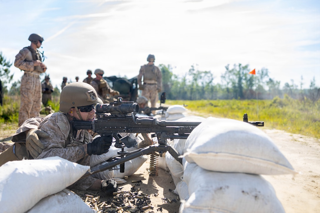 U.S. Marine Corps Lance Cpl. Gabriel Bedient, refueler operator, Marine Wing Support Squadron 273, Marine Air Control Group 28, 2nd Marine Aircraft Wing, fires an M240B machine gun while conducting a field exercise at Townsend Bombing Range, Georgia, May 6, 2026. This FEX was conducted to sustain MWSS-273’s proficiency in mission-essential tasks and increase readiness for the upcoming Weapons and Tactics Instructor course 1-27. (U.S. Marine Corps photo by Cpl. Isabella L. Renaud)