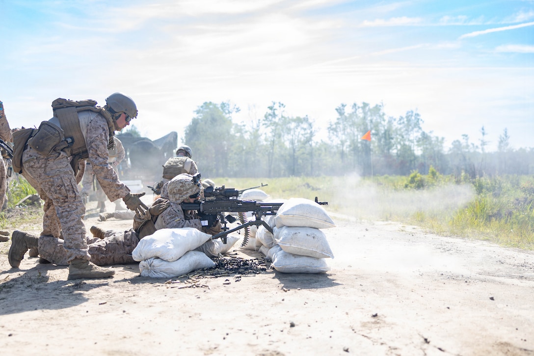 U.S. Marines with Marine Wing Support Squadron 273, Marine Air Control Group 28, 2nd Marine Aircraft Wing, fire M240B machine guns while conducting a field exercise at Townsend Bombing Range, Georgia, May 6, 2026. This FEX was conducted to sustain MWSS-273’s proficiency in mission-essential tasks and increase readiness for the upcoming Weapons and Tactics Instructor course 1-27. (U.S. Marine Corps photo by Cpl. Isabella L. Renaud)