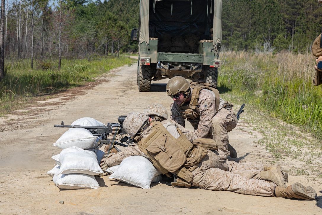 U.S. Marines with Marine Wing Support Squadron 273, Marine Air Control Group 28, 2nd Marine Aircraft Wing, fire M240B machine guns while conducting a field exercise at Townsend Bombing Range, Georgia, May 6, 2026. This FEX was conducted to sustain MWSS-273’s proficiency in mission-essential tasks and increase readiness for the upcoming Weapons and Tactics Instructor course 1-27. (U.S. Marine Corps photo by Cpl. Isabella L. Renaud)