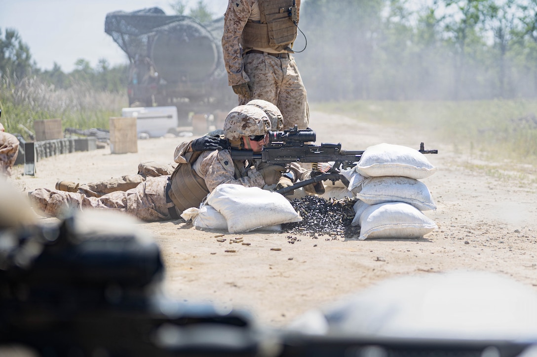 U.S. Marines with Marine Wing Support Squadron 273, Marine Air Control Group 28, 2nd Marine Aircraft Wing, fire M240B machine guns while conducting a field exercise at Townsend Bombing Range, Georgia, May 6, 2026. This FEX was conducted to sustain MWSS-273’s proficiency in mission-essential tasks and increase readiness for the upcoming Weapons and Tactics Instructor course 1-27. (U.S. Marine Corps photo by Cpl. Isabella L. Renaud)