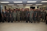 U.S. and Republic of Korea service members pose for a group photo during the opening ceremony for Combined Joint Logistics Over-the-Shore 26 at Camp Mujuk, Pohang, South Korea, July 6, 2026.
