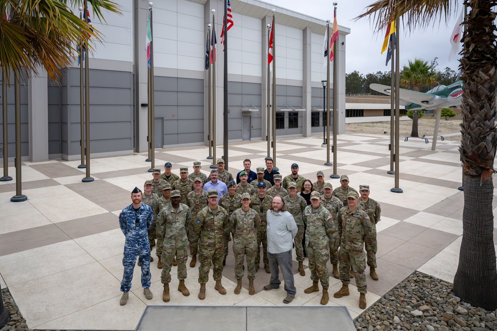 miltary memebers pose for group photo