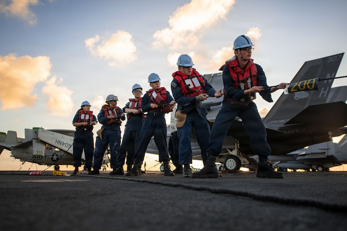 U.S. Navy Sailors heave in on the phone and distance line as Nimitz-class aircraft carrier USS Theodore Roosevelt (CVN 71) begins a fueling-at-sea with the Henry J. Kaiser-class fleet replenishment oiler USNS Guadalupe (T-AO 200) during Exercise Rim of the Pacific (RIMPAC) July 8, 2026. Thirty nations, over 30 surface ships, five submarines, 15 national land forces, more than 206 aircraft and 30,000 personnel are participating in RIMPAC in and around the Hawaiian Islands, June 24 to July 31. The world’s largest international maritime exercise, RIMPAC provides a unique training opportunity while fostering and sustaining cooperative relationships among participants critical to ensuring safety of sea lanes and security on the world’s oceans. RIMPAC 2026 is the 30th exercise in the series that began in 1971. (U.S. Navy photo by Mass Communication Specialist 3rd Class Alexander Bussman)