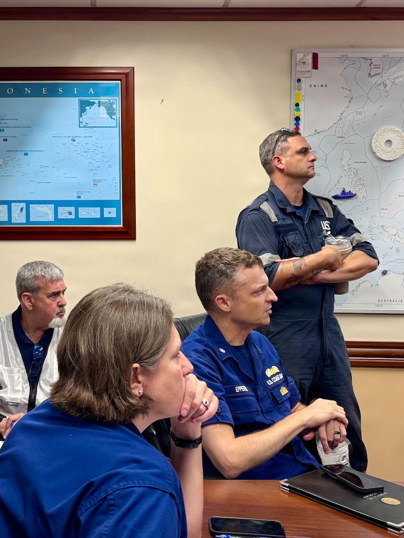A U.S. Coast Guard Incident Management Team comprised of members from units around the country coordinates port recovery operations following Super Typhoon Bavi from U.S. Coast Guard Forces Micronesia/Sector Guam in Santa Rita, Guam, on July 9, 2026. U.S. Coast Guard crews continue to assess and rectify discrepancies to aids to navigation, waterways, and channel conditions across the Marianas following Super Typhoon Bavi. (U.S. Coast Guard photo by Lt. Sara Muir)