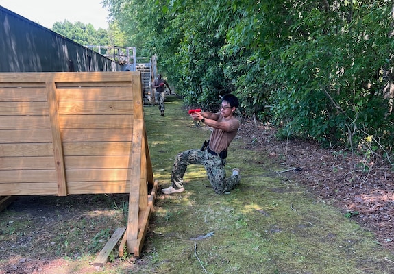 Master-at-Arms 3rd Class Thuan Nguyen, security clerk assigned to Navy Medicine Readiness and Training Command (NMRTC) Twentynine Palms, participates in Combat Skills Training (CST) in Suffolk, Virginia, June 11, 2026. The weeklong course prepares Expeditionary Medicine Sailors to operate in austere, high-threat environments by strengthening tactical skills, marksmanship and expeditionary readiness. (Courtesy photo).