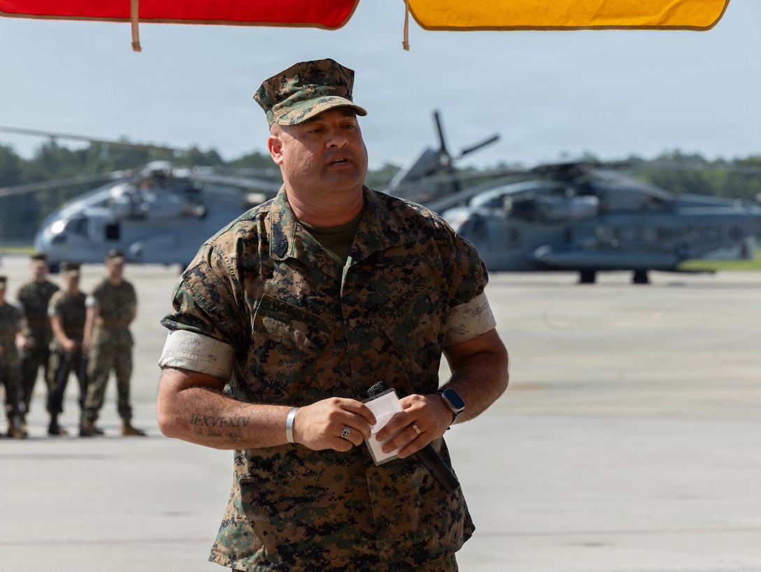 U.S. Marine Corps Sgt. Maj. Juan Vasquez, from Florida, the incoming command senior enlisted leader of Marine Light Attack Helicopter Squadron (HMLA) 269, Marine Aircraft Group 29, 2nd Marine Aircraft Wing, speaks during a relief and appointment ceremony at Marine Corps Air Station New River, North Carolina, July 1, 2025. The ceremony represented the transfer of authority, accountability, and leadership from Sgt. Maj. Perry Bessant, from South Carolina, the outgoing command senior enlisted leader to Vasquez. (U.S. Marine Corps photo by Lance Cpl. Jacsive Betancourt)