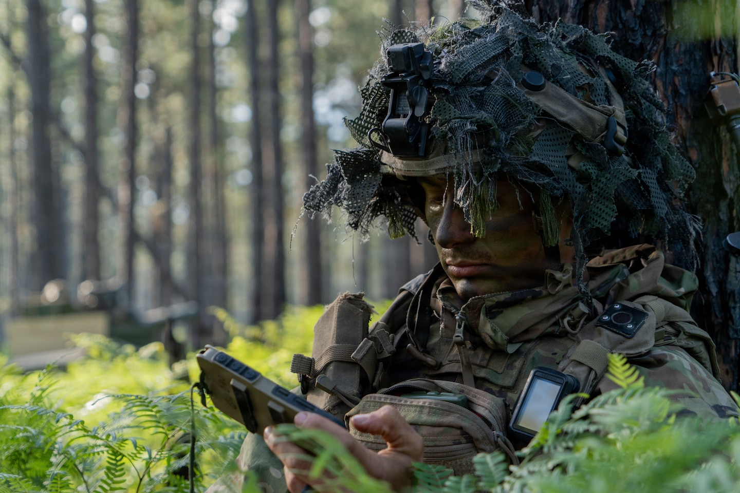 U.S. Army 1st Lt. Tim Boulet, assigned to the Multi-Functional Reconnaissance Company, 3rd Mobile Brigade Combat Team, 101st Airborne Division (Air Assault), develops a route plan using the Android Tactical Assault Kit during a Joint Readiness Training Center rotation at Fort Polk, Louisiana, April 8, 2026. Boulet uses ATAK to plan movement and coordinate operations