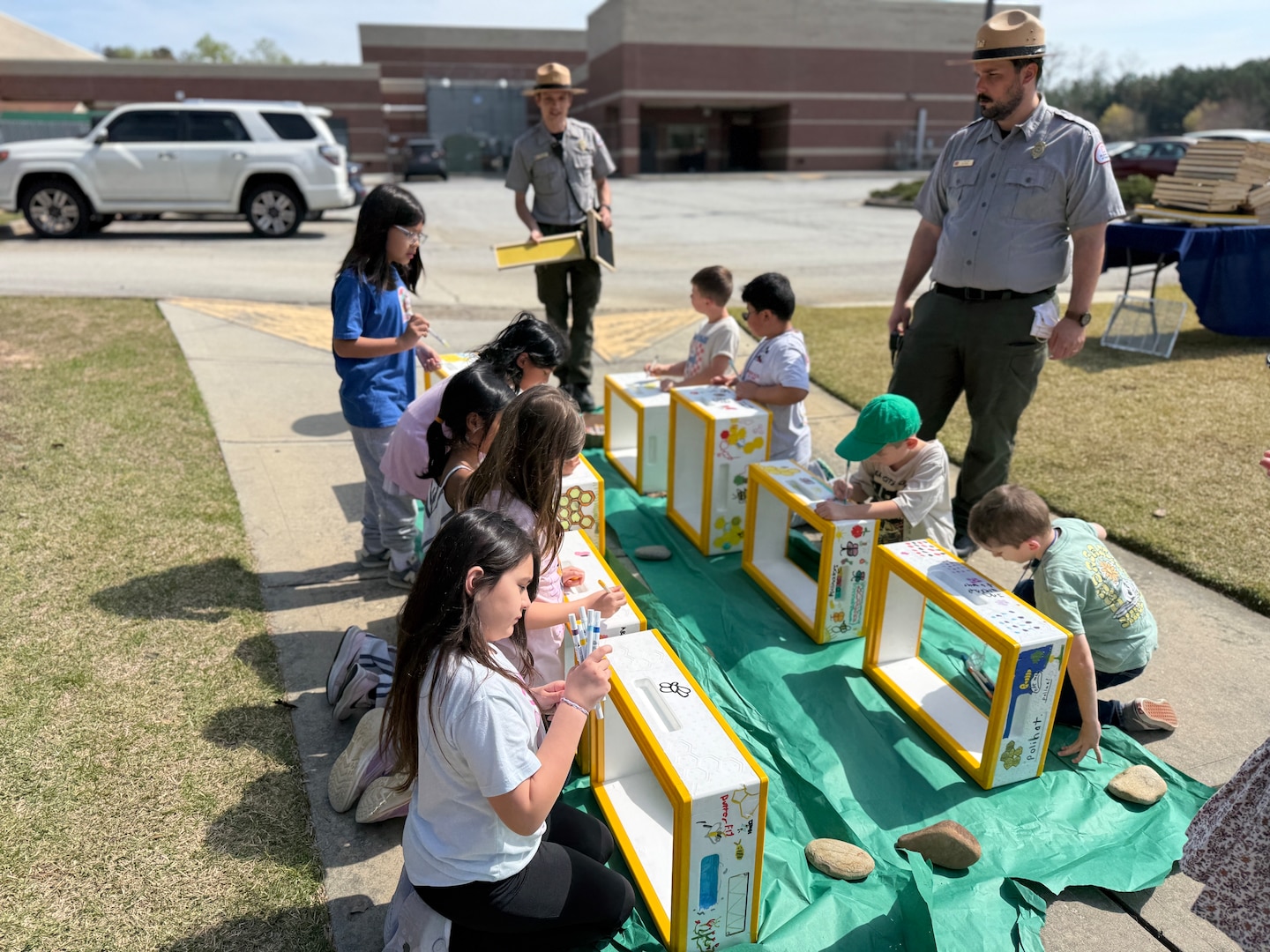 Pictures of children doing crafts.