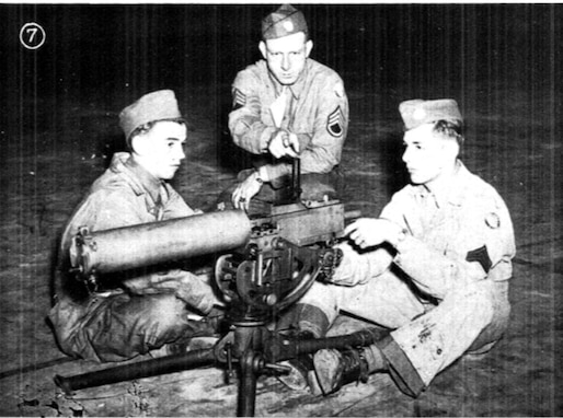 TOCCOA, Ga. January 1945 - The 4th Battalion, Georgia State Guard, forerunner of the Georgia State Defense Force trained at Camp Toccoa, the training camp depicted in Band of Brothers. In this image, Staff Sgt. Bernard South coaches Robin Brown (gunner) and M. S. Vandergriff on the Browning M1917 machine gun.