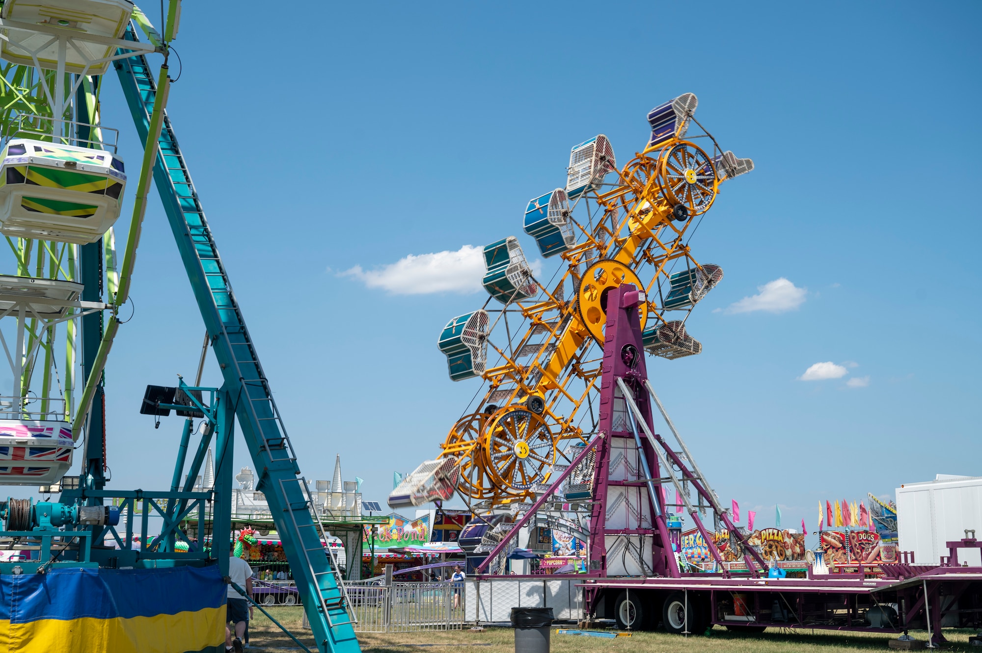 A carnival ride swings during Freedom Fest at Joint Base Anacostia-Bolling, Washington, D.C., July 4, 2026. The three-day event allowed service members and their families to celebrate America’s 250th Independence Day. (U.S Air Force photo by Senior Airman Shanel Toussaint)