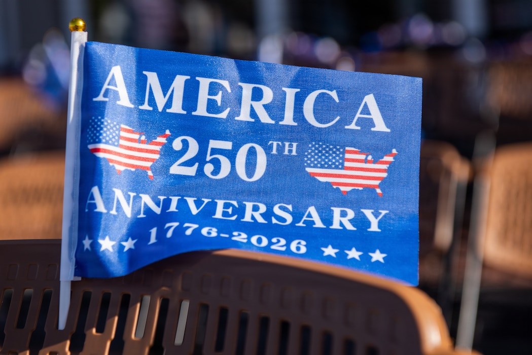 Commemorative flag adorns a chair during parade