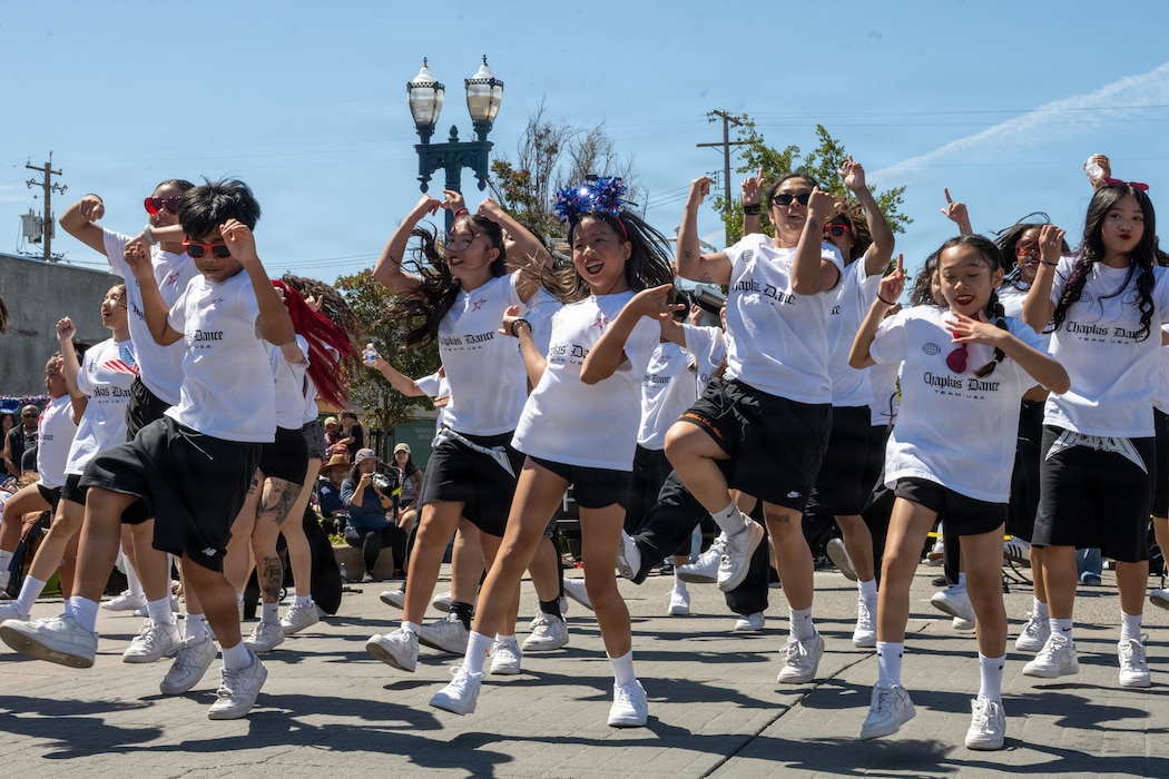 Youth dancers perform during parade