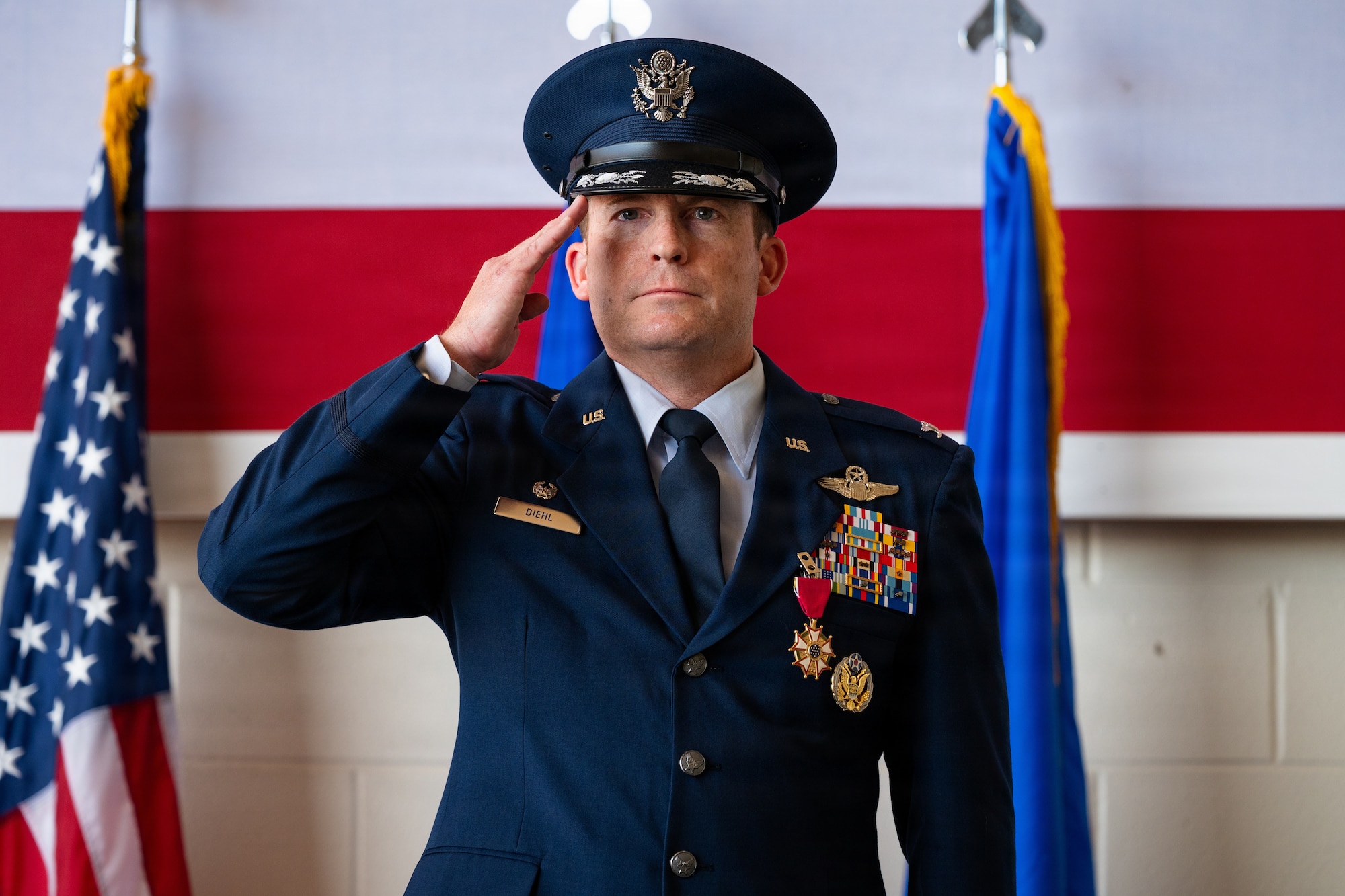 U.S. Air Force Col. Justin Diehl, outgoing 317th Airlift Wing commander, delivers his final salute to the wing during a change of command ceremony at Dyess Air Force Base, Texas, July 8, 2026. Diehl leaves Dyess to become Air Mobility Command’s deputy director of operations and nuclear integration at Scott AFB, Illinois. (U.S. Air Force photo by Senior Airman Jade M. Caldwell)