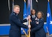Brig. Gen. Gwendolyn A. Foster (right), relinquishes the guidon to Maj. Gen. (Dr.) Robert K. Bogart is the Director, Defense Health Network Central, and Commander, Medical Readiness Command Alpha (left) at the 59th MDW change of command ceremony at Joint Base San Antonio-Lackland on July 8, 2026.