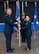Maj. Gen. (Dr.) Robert K. Bogart, Director, Defense Health Network Central, and Commander, Medical Readiness Command Alpha, (right) passes the guidon to Col. Tracy Bozung, 59th Medical Wing commander, at the 59th MDW change of command ceremony at Joint Base San Antonio-Lackland on July 8, 2026.