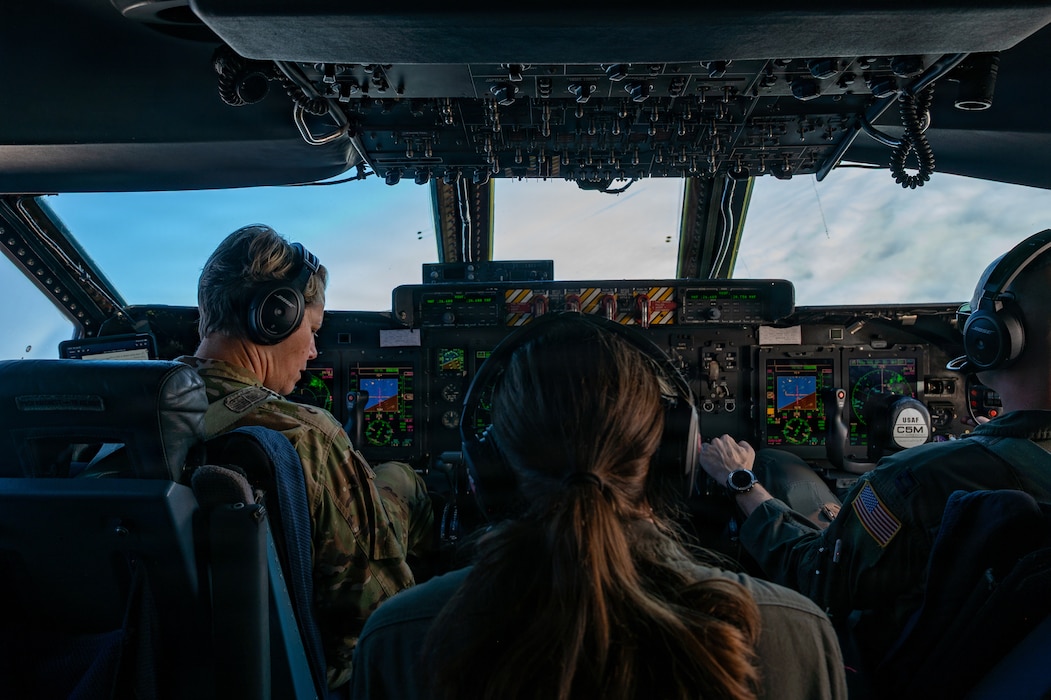 AMC interim commander pilots an aircraft.