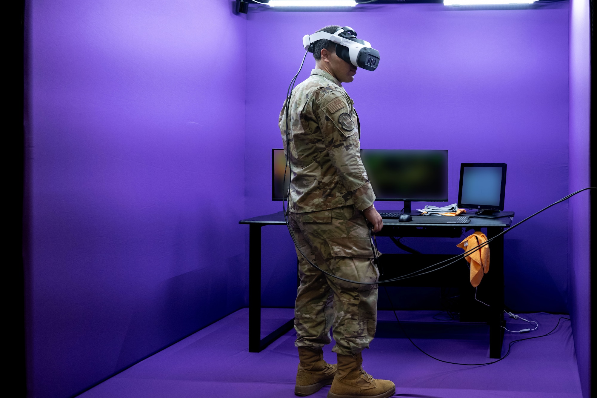 An air traffic controller assigned to the 1st Special Operations Wing utilizes a new virtual reality simulation system training bay