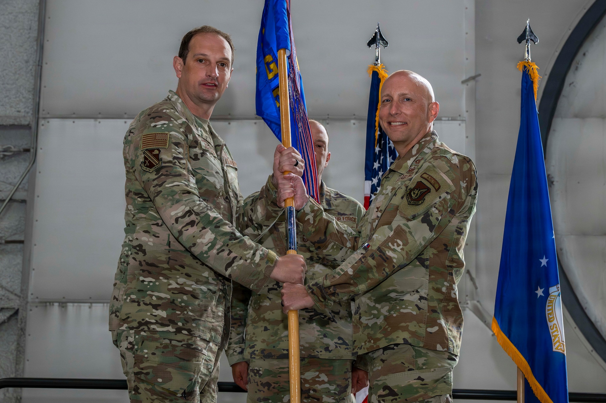 U.S. Air Force Col. Allen Branco, right, assumes command of the 354th Mission Support Group from U.S. Air Force Col. Matthew Johnston, 354th Fighter Group commander, during a change of command ceremony at Eielson Air Force Base, Alaska, July 9, 2026.