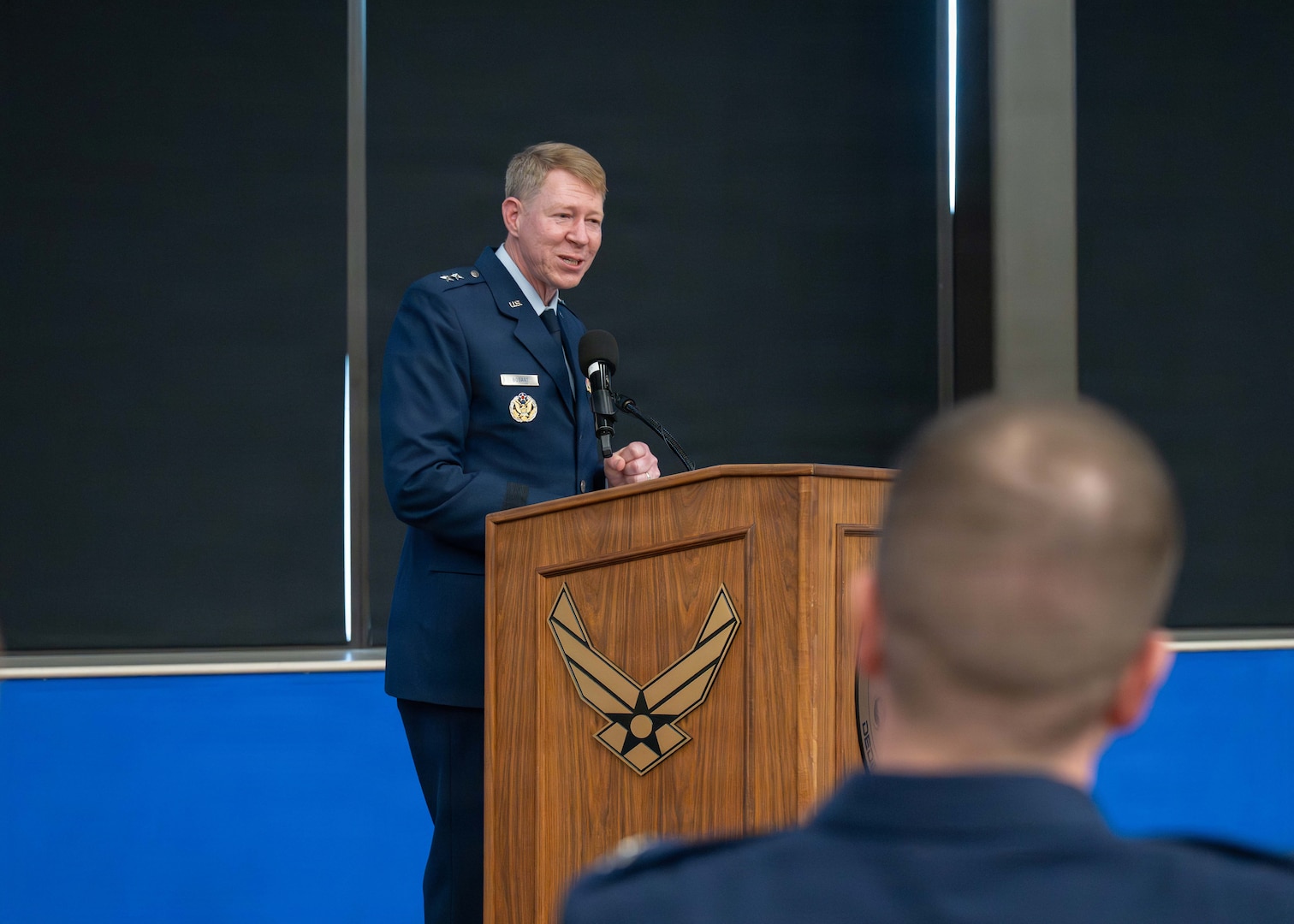 Maj. Gen. (Dr.) Robert K. Bogart is the Director, Defense Health Network Central, and Commander, Medical Readiness Command Alpha, San Antonio, Texas, speaks at the 59th Medical Wing change of command ceremony, July 8, 2026.