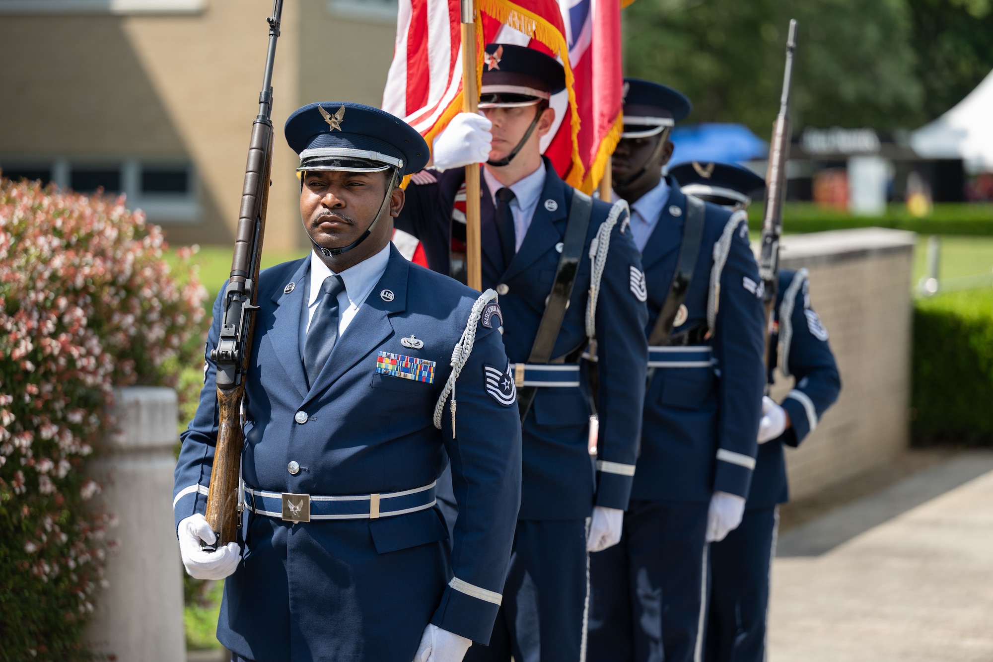 The Honor Guard from Robins Air Force Base, Georgia, prepares to present the U.S. and Tennessee state flags during the Arnold Engineering Development Complex Change of Command ceremony that took place June 27, 2026, during the AEDC 75th anniversary open house celebration at Arnold Air Force Base, Tenn., headquarters of AEDC. Outgoing AEDC Commander Col. Grant Mizell relinquished command of the Complex to incoming Commander Col. Wayne Dirkes. (U.S. Air Force photo by Keith Thornburgh)