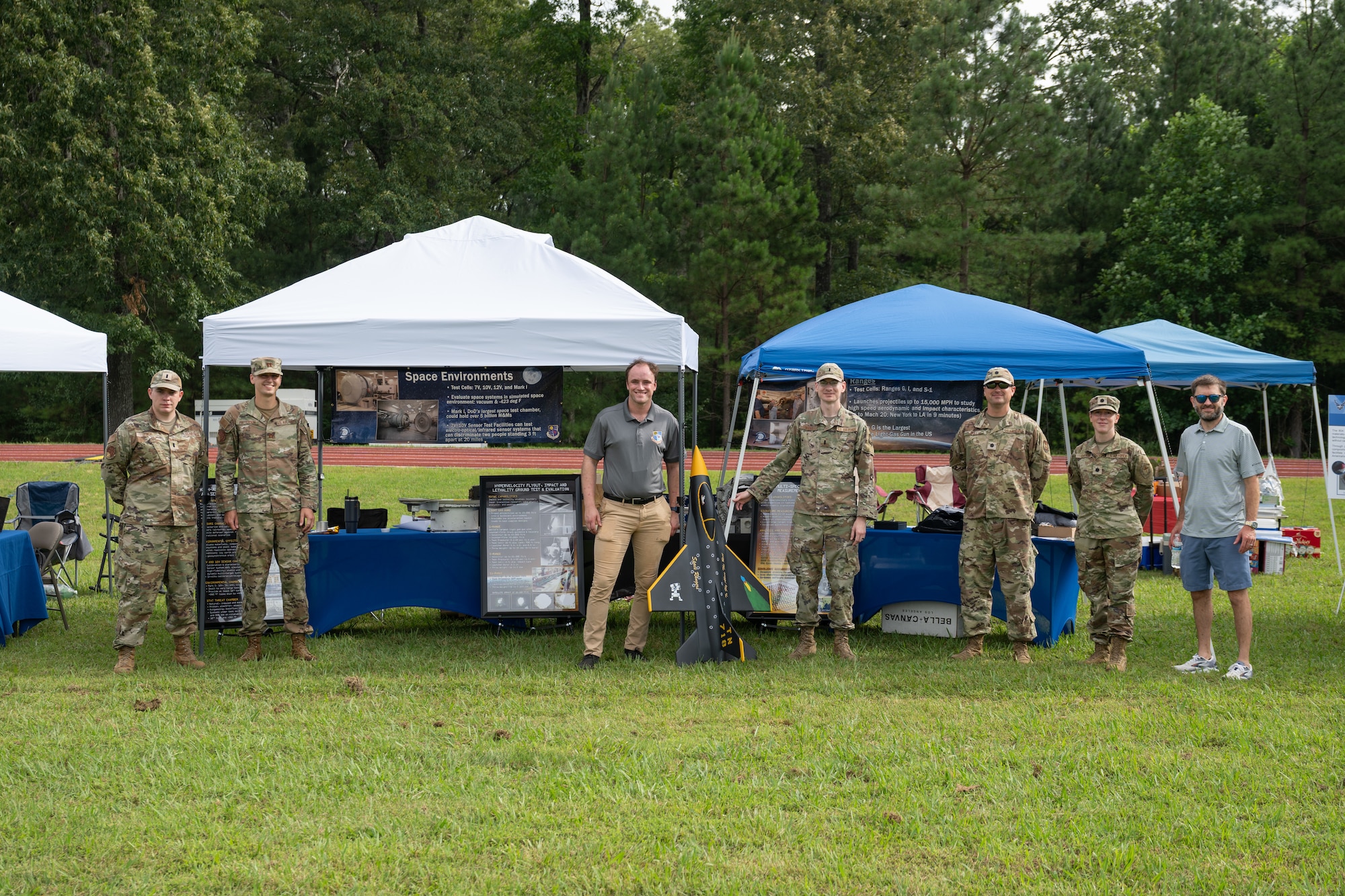 Members of the Arnold Engineering Development Complex team from the 718th Test Squadron gather for a photo during the Arnold Engineering Development Complex 75th anniversary open house celebration June 27, 2026, at Arnold Air Force Base, Tenn., headquarters of AEDC. The public open house was held to coincide with the original June 25, 1951, dedication of AEDC. The history and accomplishments of AEDC throughout its first 75 years were showcased during the open house. (U.S. Air Force photo by Keith Thornburgh)