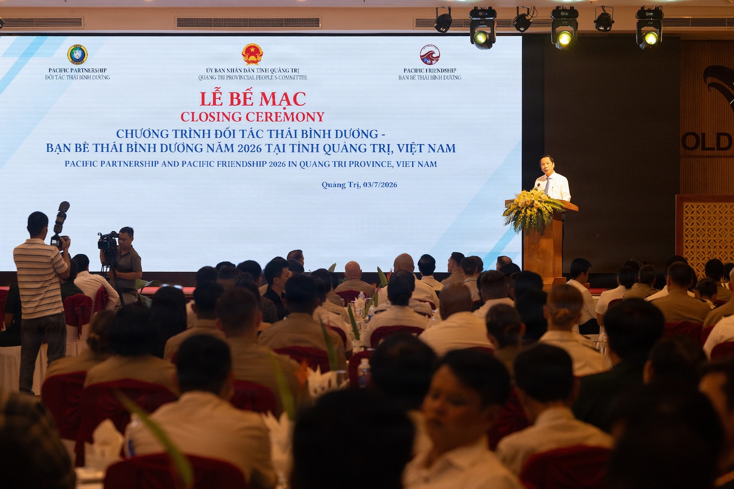 Mr. Hoang Nam, standing vice chairman of the Provincial People's Committee, delivers remarks during the Pacific Partnership 2026 and Pacific Friendship 2026 joint closing ceremony in Quang Tri, Vietnam, July 3, 2026.