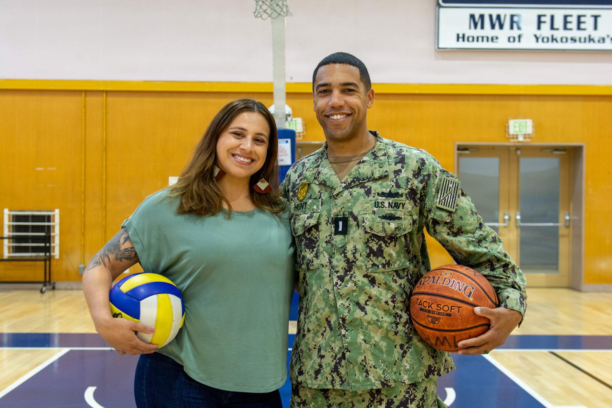Andrea and Byron Hunt, volunteer coaches for Commander, Fleet Activities Yokosuka (CFAY) Youth Sports, lead seven different athletic programs on the installation to bolster community morale and support military family readiness.