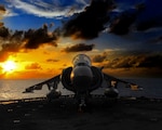 An AV-8B Harrier II, attached to Marine Medium Tiltrotor Squadron (VMM) 163 (Reinforced) rests on the flight deck elevator of amphibious assault ship USS Boxer (LHD 4), Oct.25, 2019.