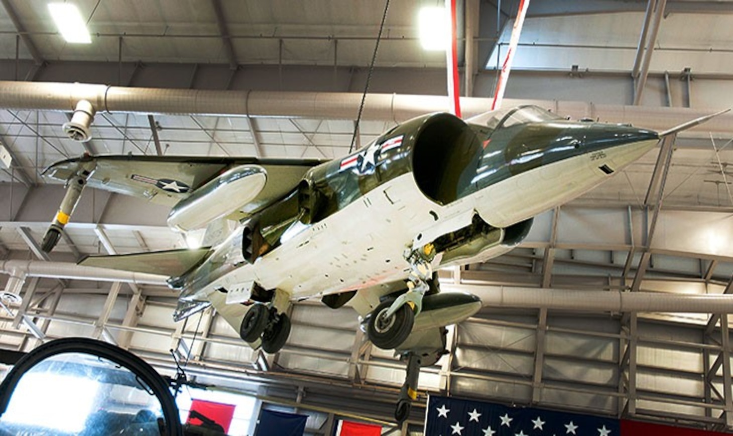 AV-8C Harrier (Bureau Number 158975) pictured suspended in Hangar Bay One at the National Naval Aviation Museum.