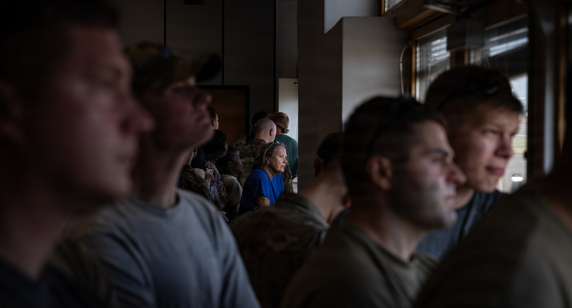 Team Mildenhall members watch the Air Force’s VC-25B Bridge aircraft land at RAF Mildenhall, England, July 8, 2026.