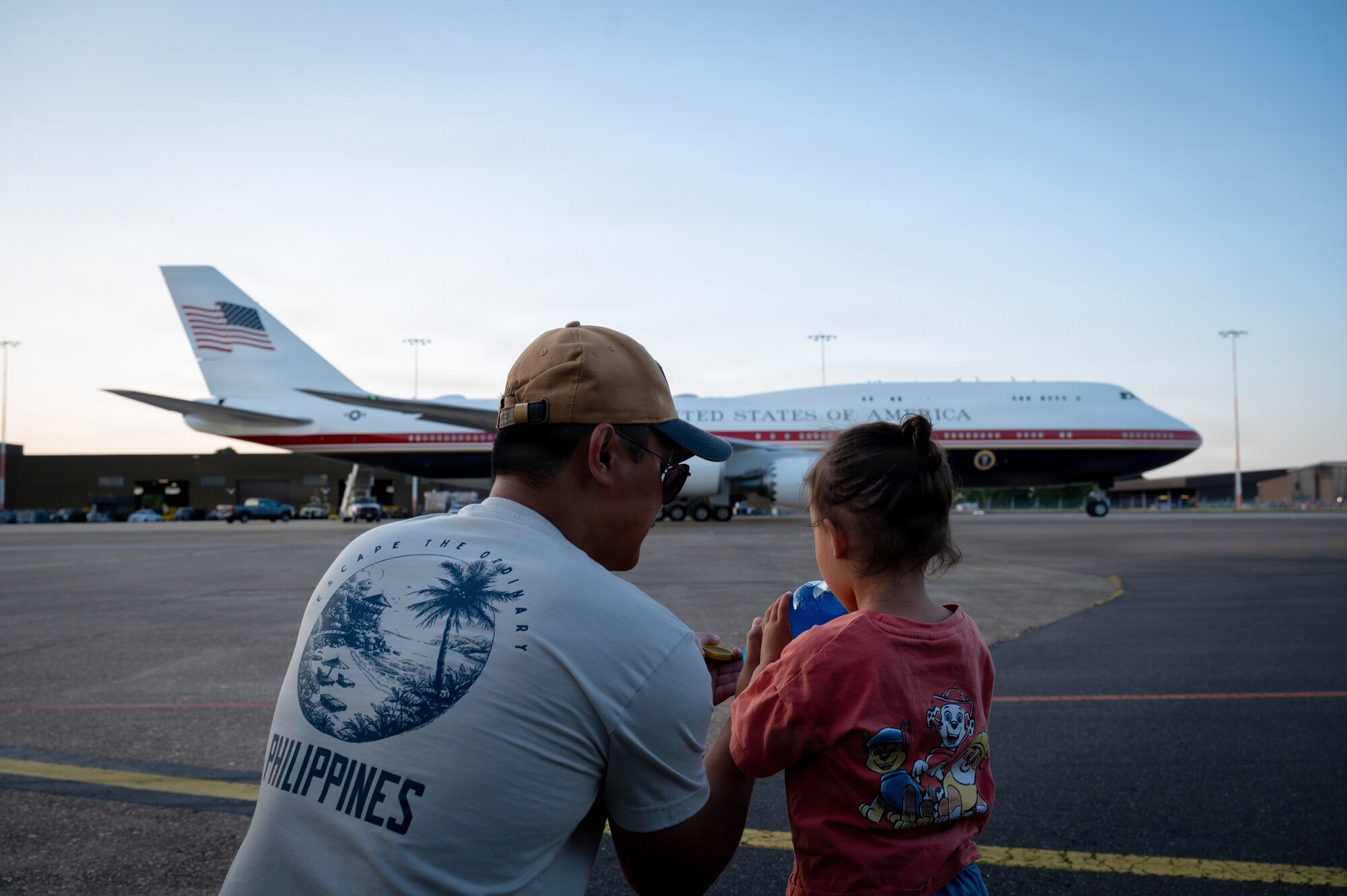 Members of Team Mildenhall view the Air Force’s VC-25B Bridge aircraft on the flightline at RAF Mildenhall, England, July 8, 2026.
