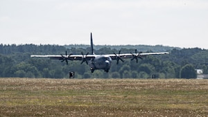 A U.S. Air Force C-130J Super Hercules aircraft assigned to the 37th Airlift Squadron lands on the flightline during a mission as part of a flying training deployment at RAF Mildenhall, England, July 8, 2026.