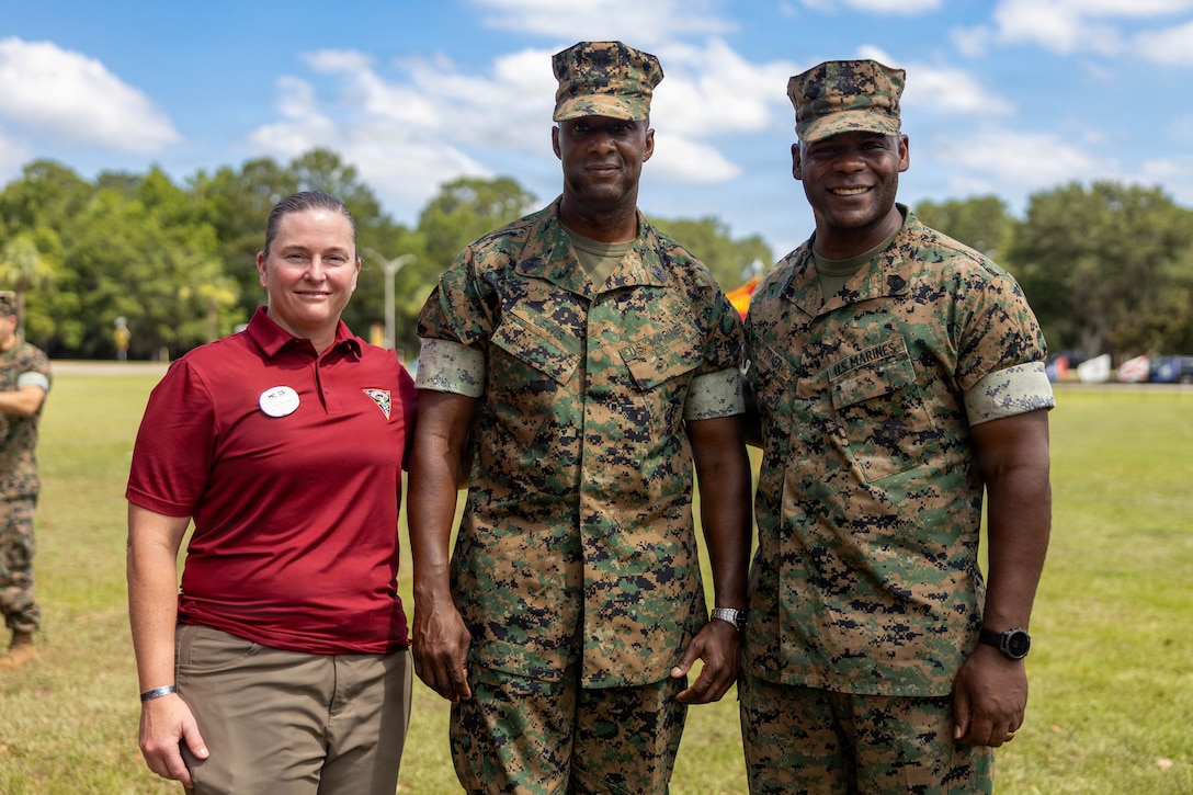 U.S. Marine Corps retired Sgt. Maj. Christine M. Henning, left, Sgt. Maj. Lacey J. Lewis, in-coming sergeant major, Marine Corps Air Station Beaufort, center, and Sgt. Maj. Wesley O. Turner, command senior enlisted leader, Marine Corps Installations East-Marine Corps Base Camp Lejeune, pose for a photo during a Relief and Appointment Ceremony at MCAS Beaufort, South Carolina, July 1, 2026. The ceremony recognized Sgt. Maj. Bryan M. Alfaro, out-going sergeant major, MCAS Beaufort, for his service, leadership and dedication to the unit while welcoming Lewis. (U.S. Marine Corps photo by Cpl. Isabella Renaud)