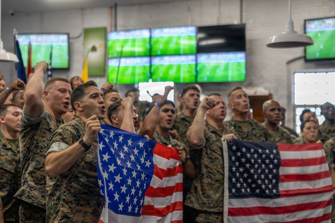 U.S. Marines celebrate during the FIFA World Cup 2026 watch party at Marine Corps Recruit Depot Parris Island, South Carolina, July 1, 2026. The watch party was hosted by Marine Corps Community Services and televised by FOX Sports to bolster comradery and moral within surrounding units. (U.S. Marine Corps photo by Lance Cpl. Carl J. Walters)