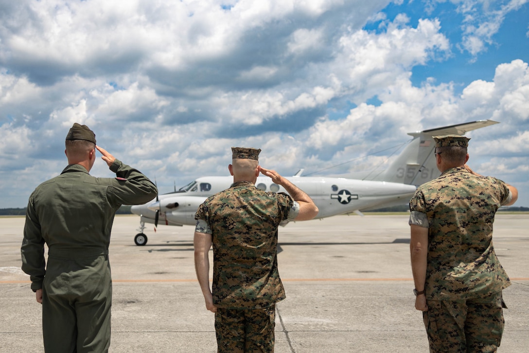 Leaders of Marine Corps Air Station Beaufort salute during the arrival of Brig. Gen. Patrick F. Tiernan, commanding general, 4th Marine Aircraft Wing, Marine Forces Reserve, at MCAS Beaufort, South Carolina, July 7, 2026. During the visit, Tiernan engaged in discussions regarding the future of Marine Fighter Training Squadron 402, fleet adversary support, Reserve Component support to the Active Component, and toured hangars, facilities, and barracks.
