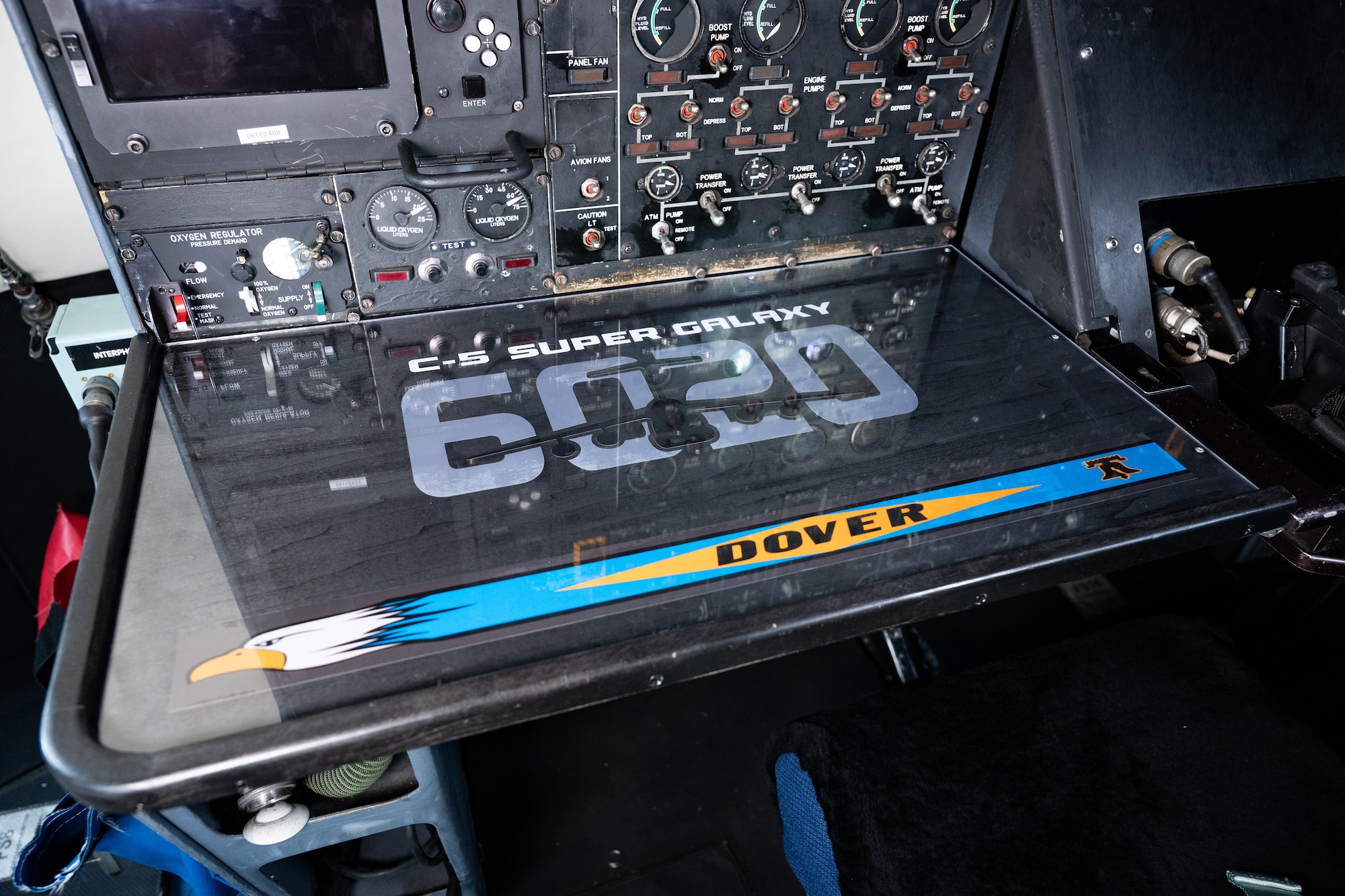 Photos show the Dover Air Force Base C-5M Galaxy Flight Deck Refurbishment project at Dover Air Force Base, Delaware, May 20-July 6, 2026. The project restored worn interior areas of a C-5M Super Galaxy, including the flight deck, crew seating, crew tables and ceiling panels, during the aircraft’s scheduled Major Isochronal Inspection without adding maintenance downtime. Tail 6020 was the first aircraft completed under Dover’s C-5M refurbishment pilot effort, which aims to return cleaner, more functional aircraft spaces to the flight line. (U.S. Air Force photos by Senior Airman Keira Rossman)