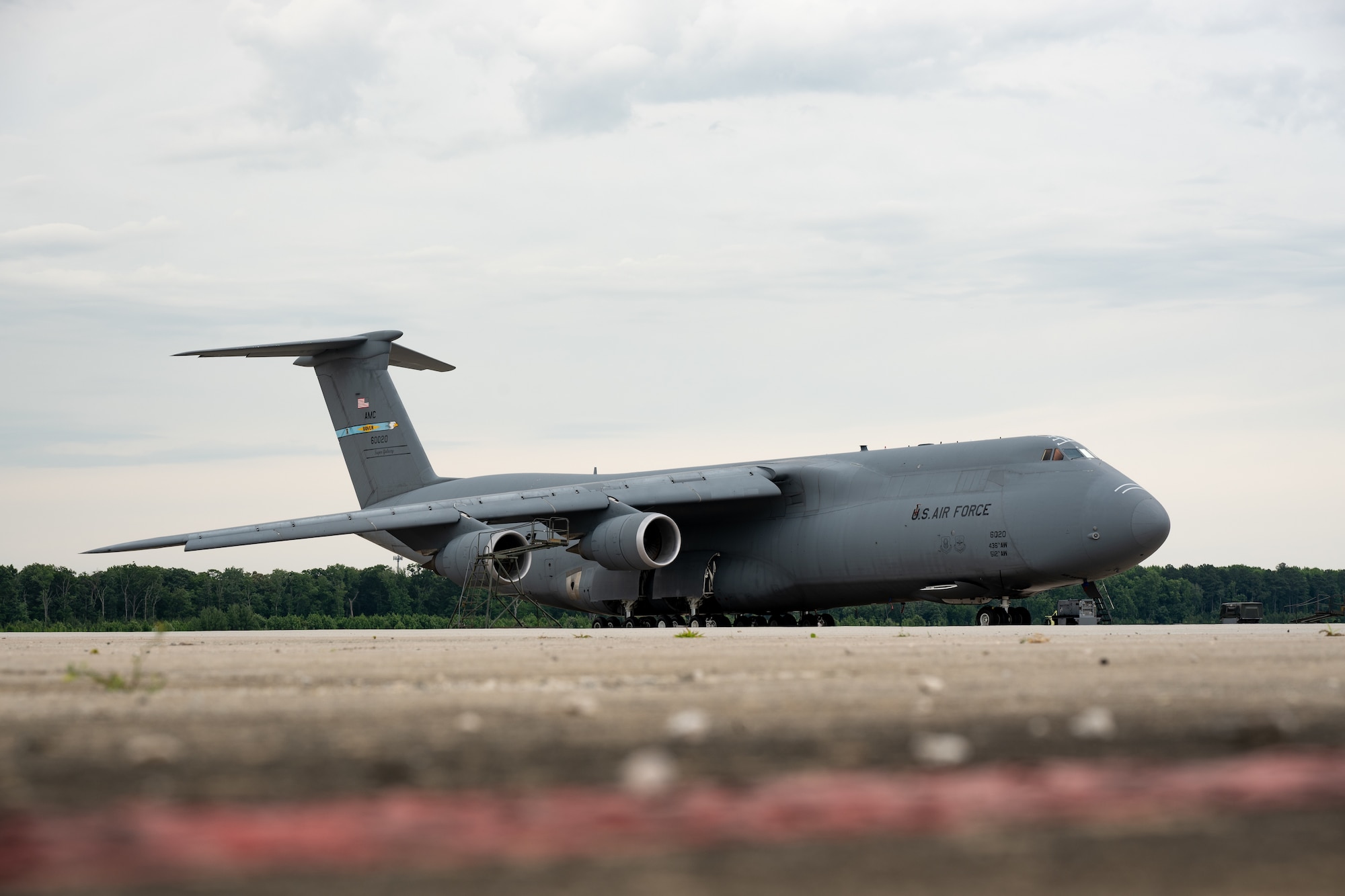 Photos show the Dover Air Force Base C-5M Galaxy Flight Deck Refurbishment project at Dover Air Force Base, Delaware, May 20-July 6, 2026. The project restored worn interior areas of a C-5M Super Galaxy, including the flight deck, crew seating, crew tables and ceiling panels, during the aircraft’s scheduled Major Isochronal Inspection without adding maintenance downtime. Tail 6020 was the first aircraft completed under Dover’s C-5M refurbishment pilot effort, which aims to return cleaner, more functional aircraft spaces to the flight line. (U.S. Air Force photos by Senior Airman Keira Rossman)