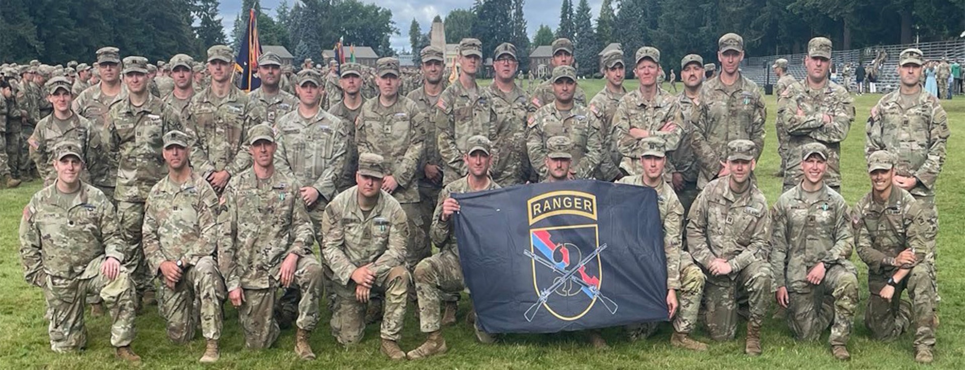 Soldiers from Washington National Guard's 3rd Battalion, 161st Infantry Regiment take a group photo following the badging ceremony for the Expert Infantry Badge/Expert Soldier Badge, June 26, 2026, Joint Base Lewis-McChord, Washington.