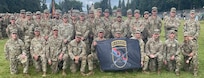 Soldiers from Washington National Guard's 3rd Battalion, 161st Infantry Regiment take a group photo following the badging ceremony for the Expert Infantry Badge/Expert Soldier Badge, June 26, 2026, Joint Base Lewis-McChord, Washington.
