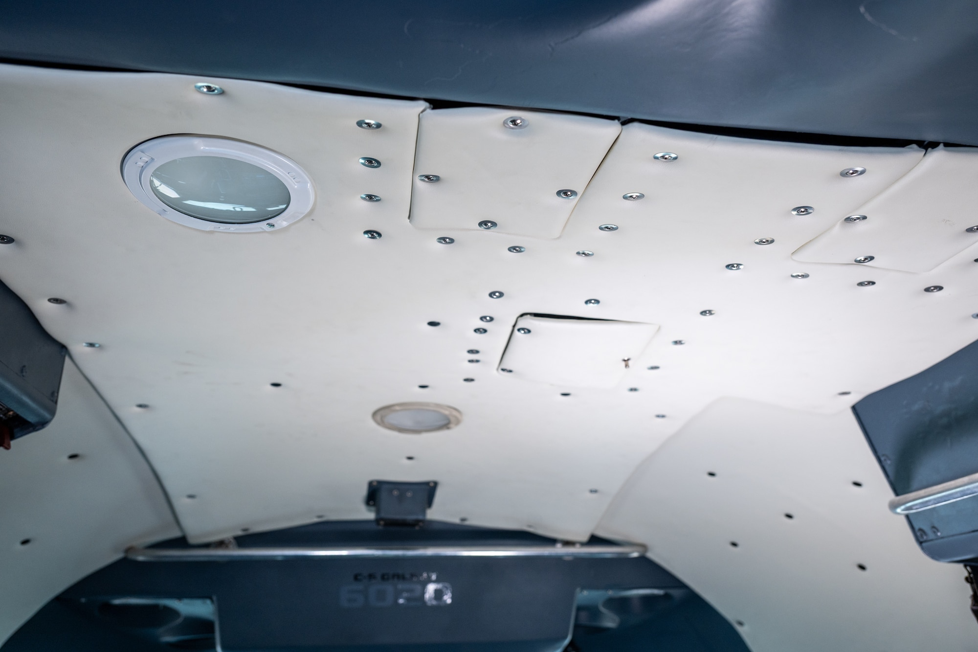 Photos show the Dover Air Force Base C-5M Galaxy Flight Deck Refurbishment project at Dover Air Force Base, Delaware, May 20-July 6, 2026. The project restored worn interior areas of a C-5M Super Galaxy, including the flight deck, crew seating, crew tables and ceiling panels, during the aircraft’s scheduled Major Isochronal Inspection without adding maintenance downtime. Tail 6020 was the first aircraft completed under Dover’s C-5M refurbishment pilot effort, which aims to return cleaner, more functional aircraft spaces to the flight line. (U.S. Air Force photos by Senior Airman Keira Rossman)