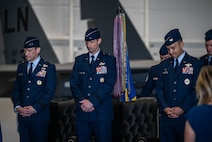48th FW command team lower their heads in prayer