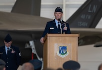 Maj. Gen. Paul D. Moga speaks at a change of command