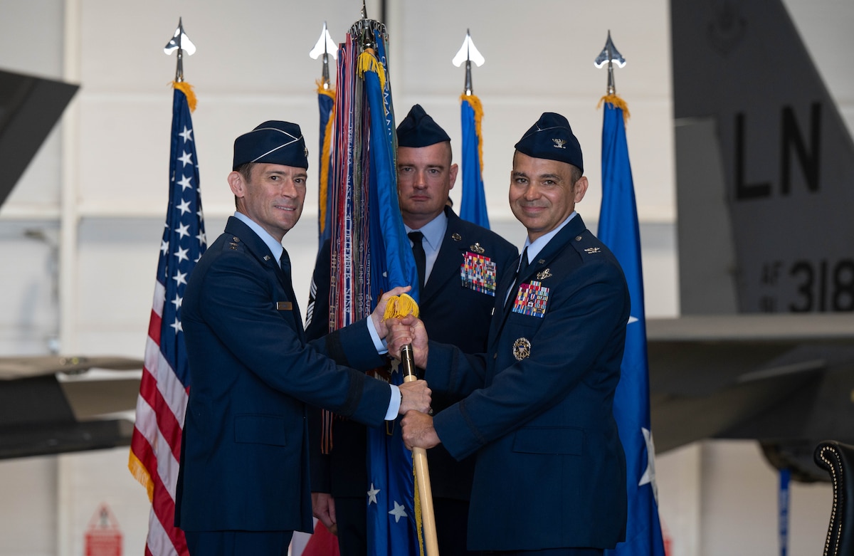 Col. Alfaro accepts guidon from Maj. Gen. Paul D. Moga