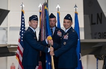Col. Alfaro accepts guidon from Maj. Gen. Paul D. Moga