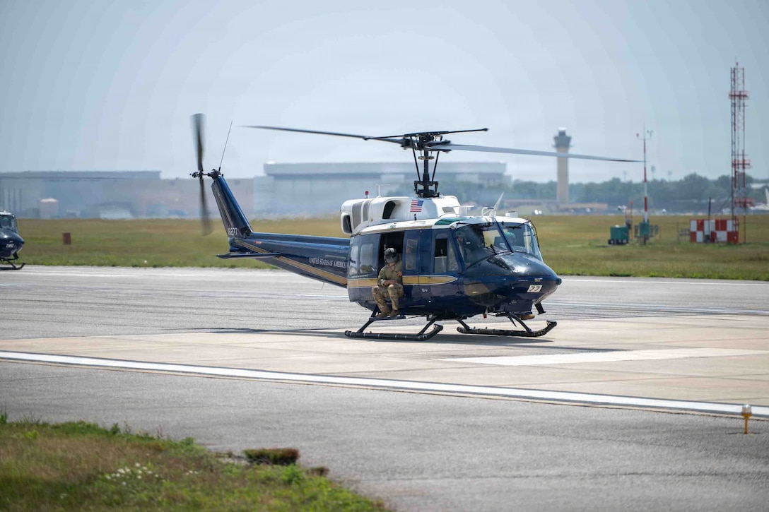 A UH-1N Huey assigned to the 1st Helicopter Squadron taxis into position before an Elephant Walk.
