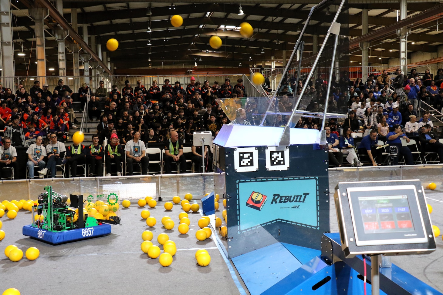 Teams compete on the field during the Ventura College FIRST Robotics Competition at the Ventura College Sportsplex in Ventura, Calif., March 15.