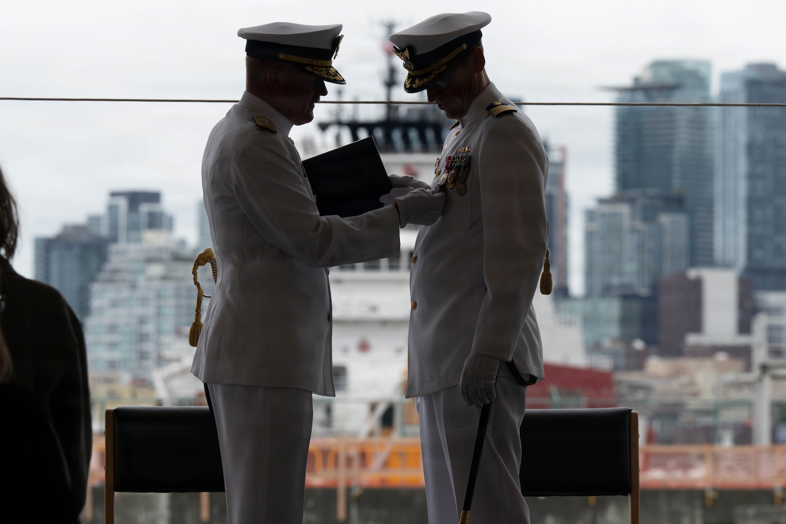Coast Guard Capt. Jeffrey J. Rasnake is awarded the meritorious service medal during the USCGC Polar Star's (WAGB 10) change of command ceremony at U.S. Coast Guard Base Seattle, June 29, 2026. Rasnake served as the cutter's commanding officer since July 2024. (U.S. Coast Guard photo by Petty Officer 3rd class Adrian Sanchez Villa)